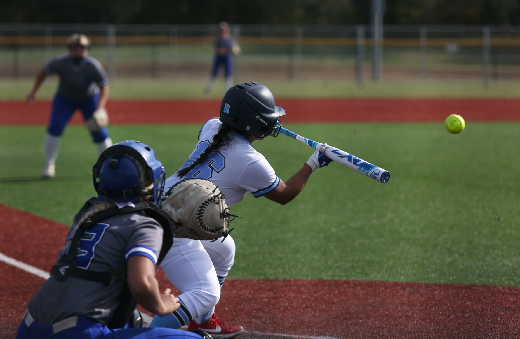 Tolton freshman Eva Viox bunts a pitch against Russellville